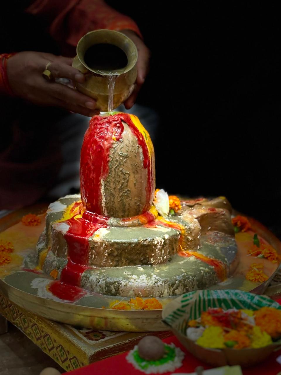 Abhishek offered over a Shiva lingam during worship.